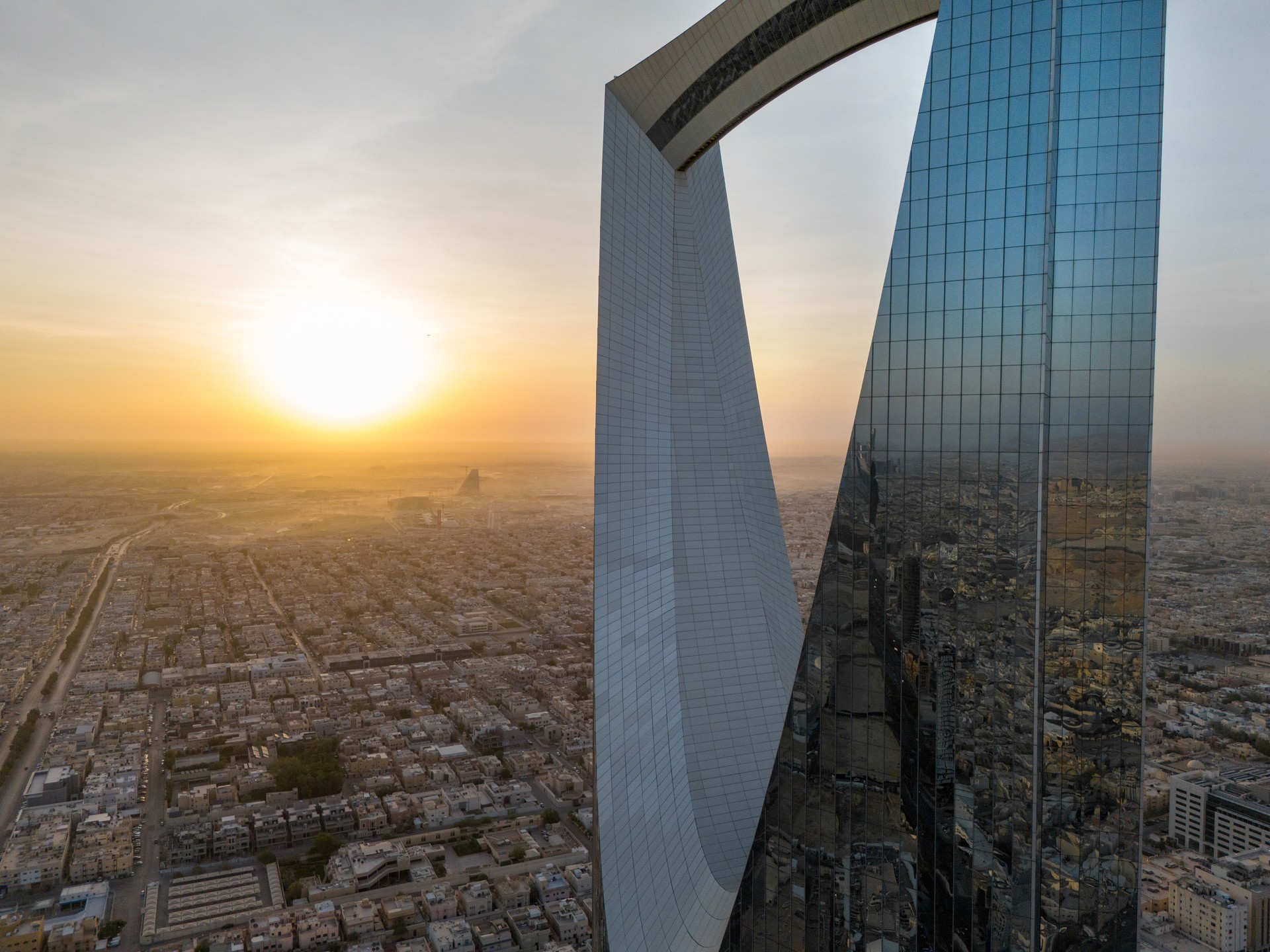 Drone shot flying. Saudi Arabia. Riyadh. Sunrise. Kingdom Tower